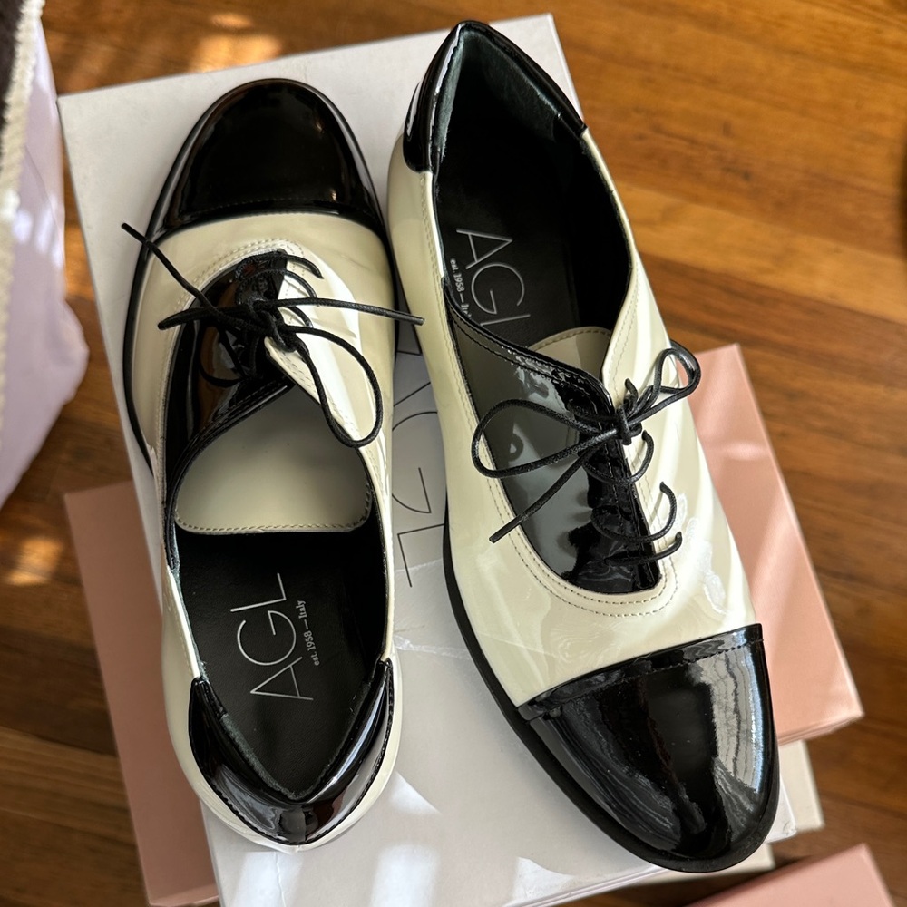 AGL Black and Cream Patent Leather Loafers